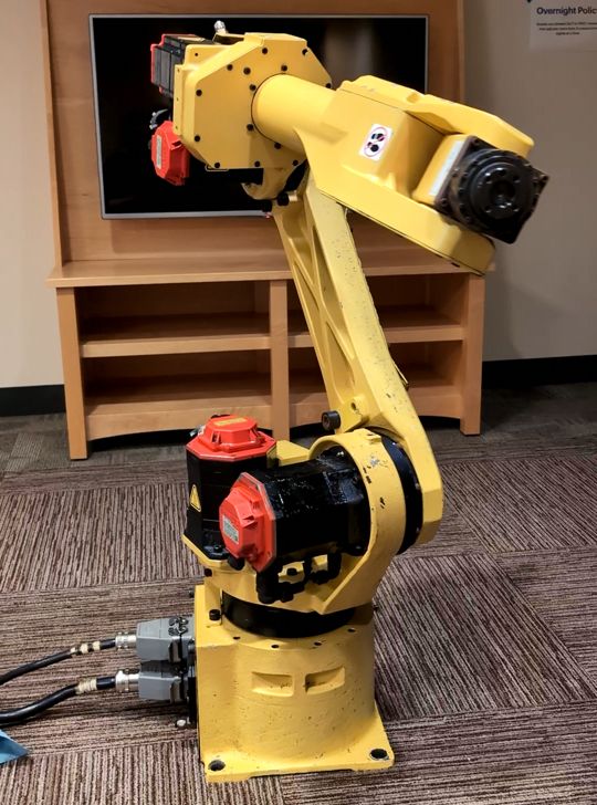 A picture of the robot arm running a program